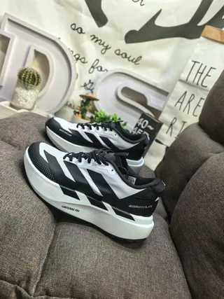 Adidas Adizero Evo SL ATR chaussures de course blanches et noires 7