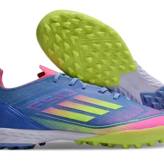 Adidas Sapatos de futebol azul rosa de corte baixo com parte superior sintética detalhes de listras degradadas para gramado artificial