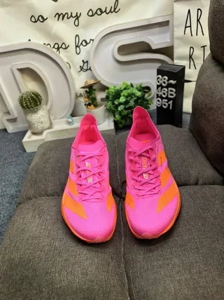 Adidas Rose Orange Profil bas Silhouette de course Tige en maille ingénierie Chaussures de course 10
