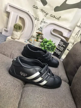 Adidas Tokyo Black Laceless Three-Stripe Lifestyle Sneakers 9
