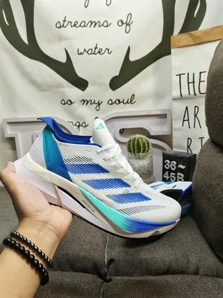Adidas Blanco Azul Parte Superior de Malla Ingenierada Tres Rayas Laterales Marcas Zapatos de Running 5