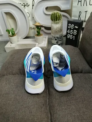Adidas Blanco Azul Parte Superior de Malla Ingenierada Tres Rayas Laterales Marcas Zapatos de Running 8