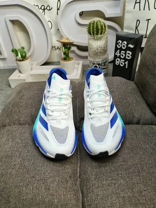 Adidas Blanco Azul Parte Superior de Malla Ingenierada Tres Rayas Laterales Marcas Zapatos de Running 10
