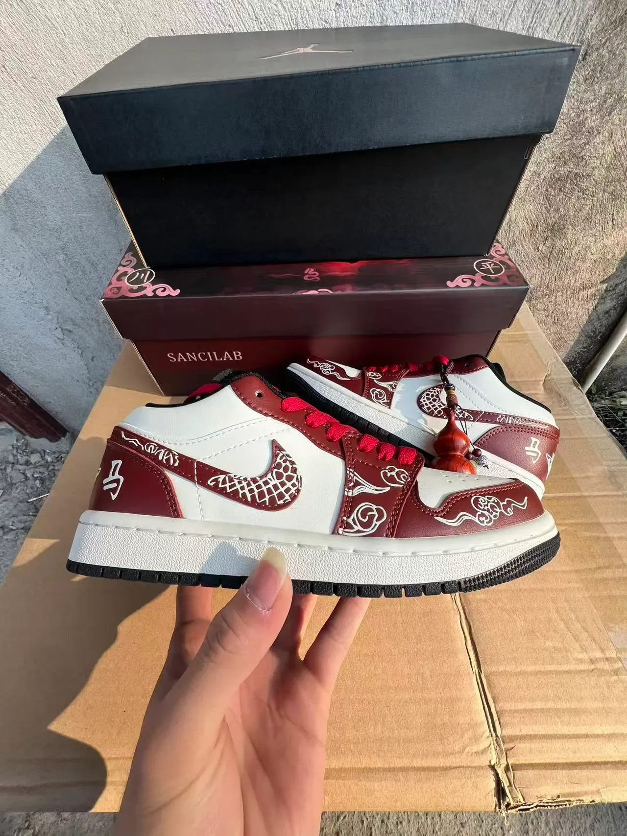 Air Jordan 1 Low Red and White Embroidered Cloud Motif Lifestyle Sneakers 7
