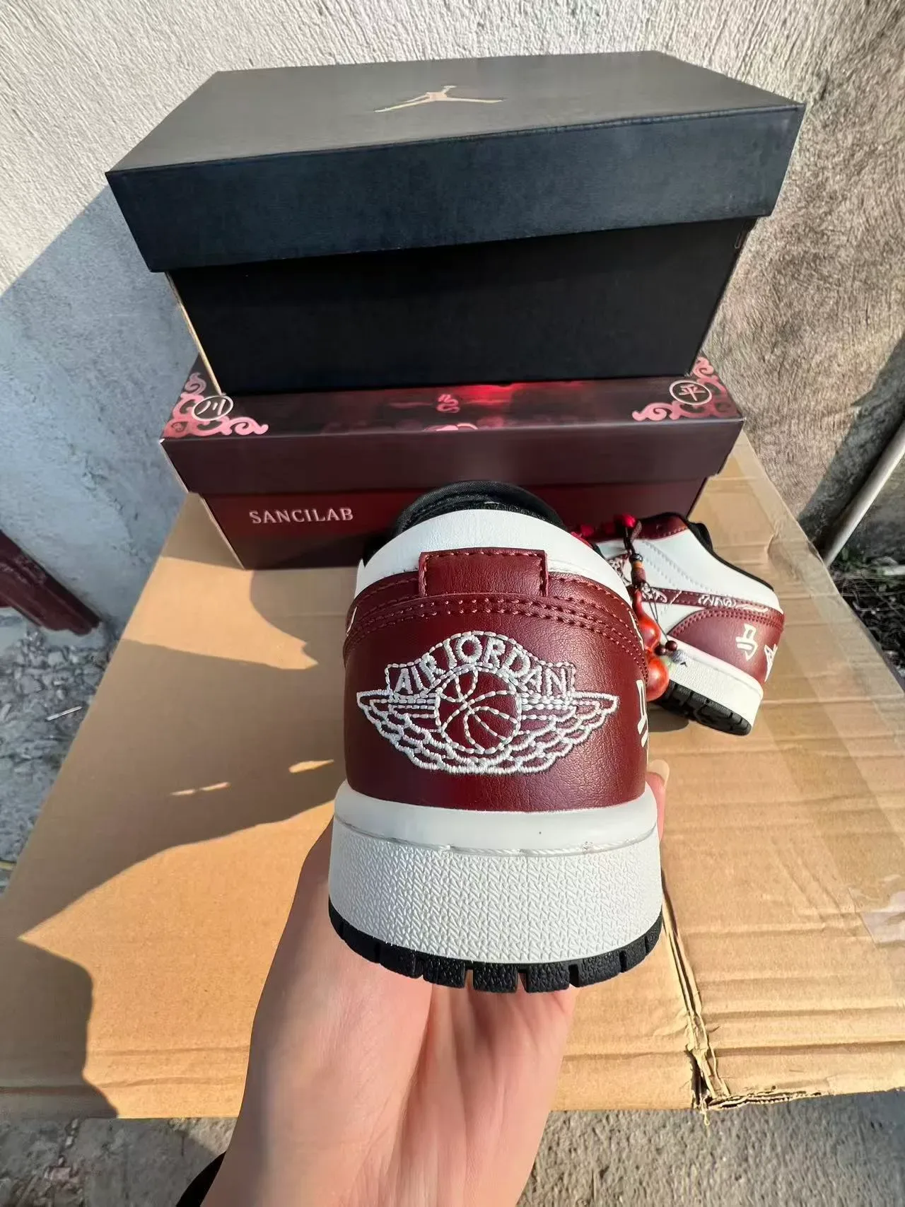 Air Jordan 1 Low Red and White Embroidered Cloud Motif Lifestyle Sneakers 8