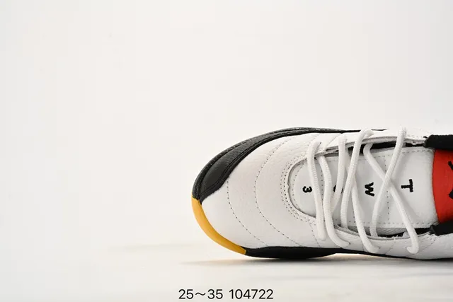 حذاء كرة السلة للأطفال Air Jordan 12 أسود وأصفر 21