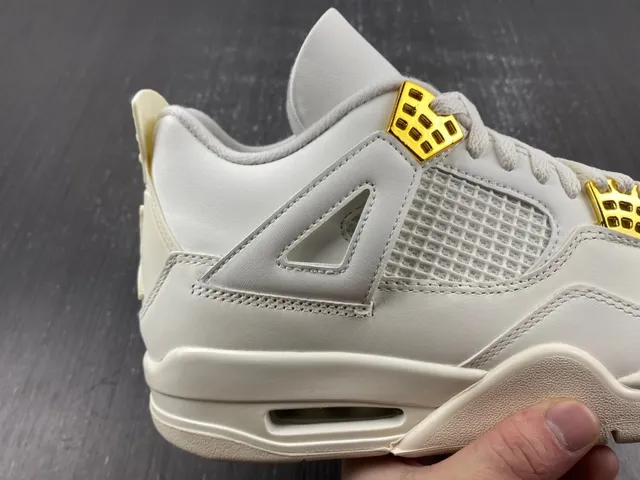 Air Jordan 4 Beige Gold Low-Top Silhouette Molded Plastic Eyelets Lifestyle Sneakers 5