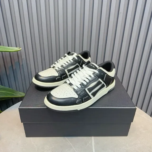 Amiri Skel Top Low tênis lifestyle preto e branco 2