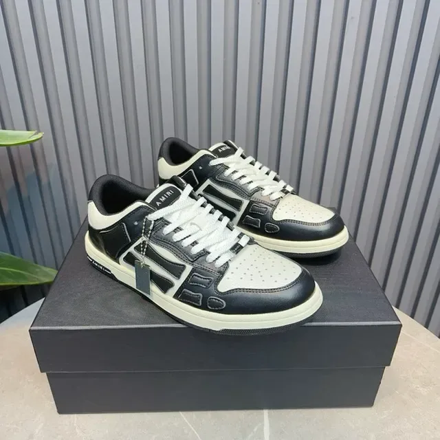 Amiri Skel Top Low tênis lifestyle preto e branco 7
