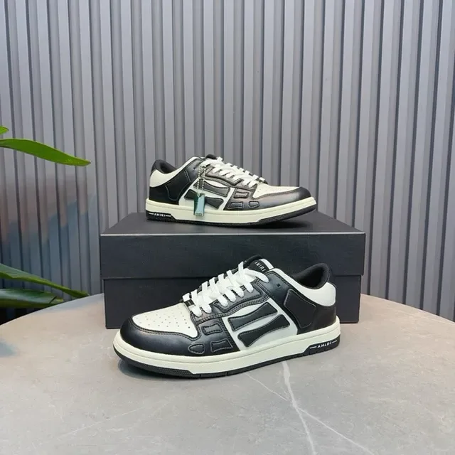 Amiri Skel Top Low tênis lifestyle preto e branco 9
