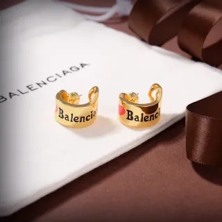 Balenciaga Brincos em ouro vermelho abertos com logo gravado