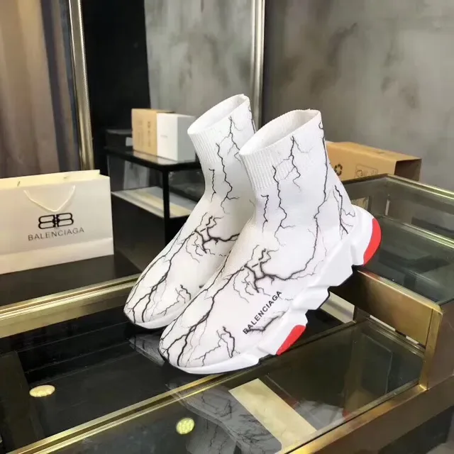 Balenciaga Speed Trainer sneakers lifestyle en marbre blanc avec motif craquelé 2