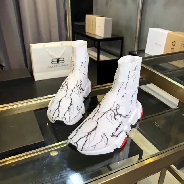 Balenciaga Speed Trainer sneakers lifestyle en marbre blanc avec motif craquelé 5