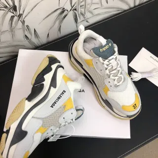 Balenciaga Triple S حذاء رياضي سميك أبيض أصفر أسود