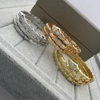 Bvlgari Serpenti Silver Gold Coiled Serpent Articulated Scale Links Bracelet