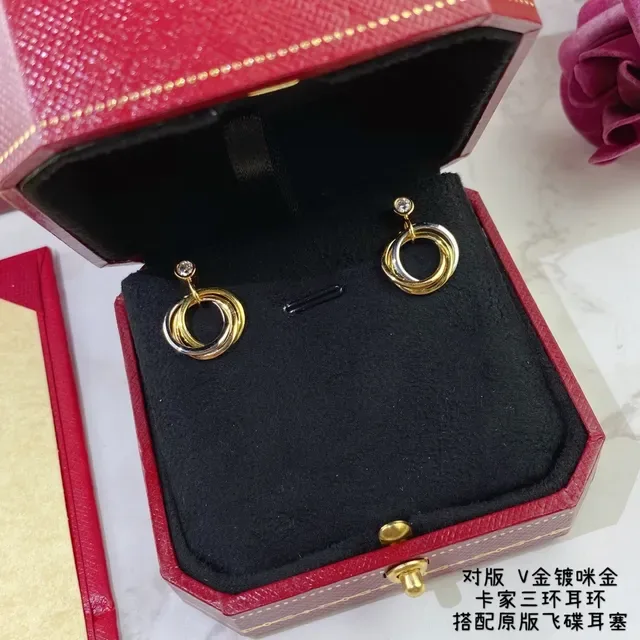 Cartier Trinity Boucles d'oreilles or et argent triple entrelacées un seul diamant 3