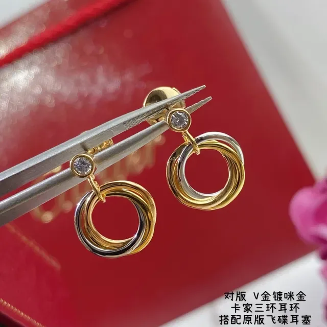 Cartier Trinity Boucles d'oreilles or et argent triple entrelacées un seul diamant 4