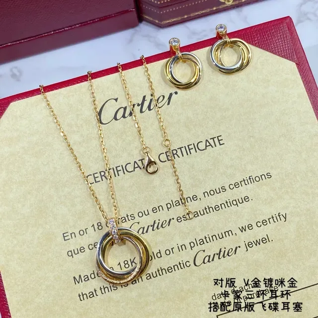 Cartier Trinity Boucles d'oreilles or et argent triple entrelacées un seul diamant 6
