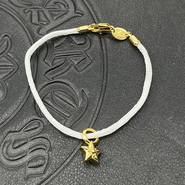 Chrome Hearts Cross and Sword Cord Bracelet Roja Negra Trenzada Hardware Dorado 4