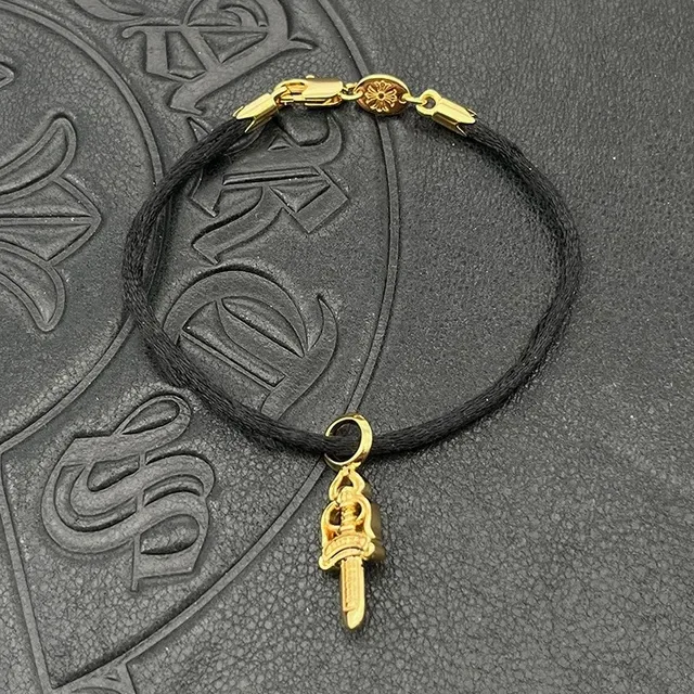 Chrome Hearts Cross and Sword Cord Bracelet Roja Negra Trenzada Hardware Dorado 9