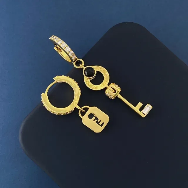 Fendi Lock & Key Brincos assimétricos de cristal e ónix dourado 4