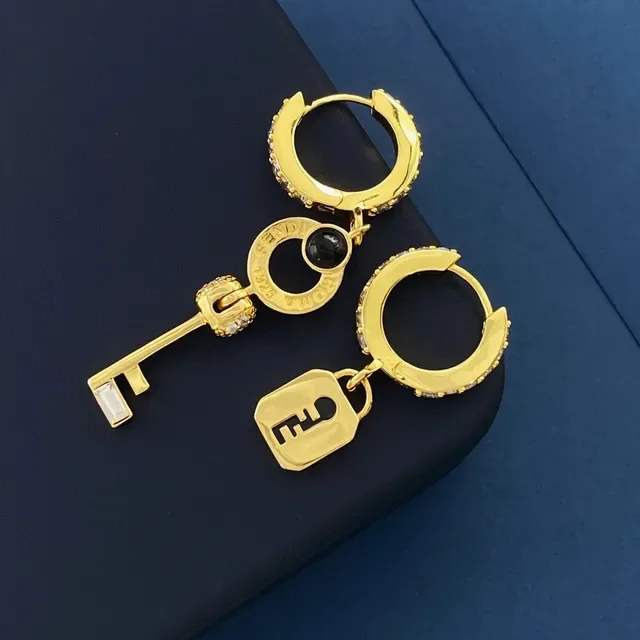 Fendi Lock & Key Brincos assimétricos de cristal e ónix dourado 6