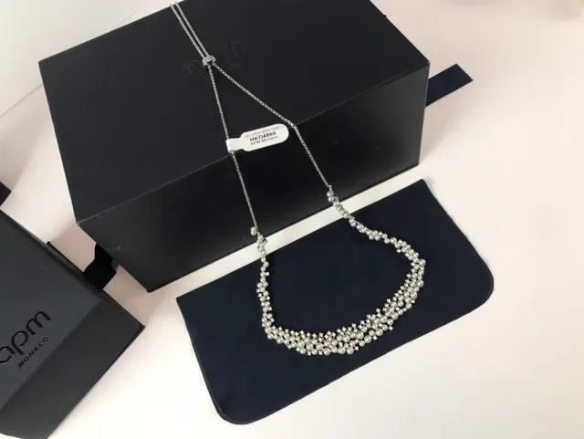 APM Monaco Multi-Strand Pearl and Star Motif Necklace 8
