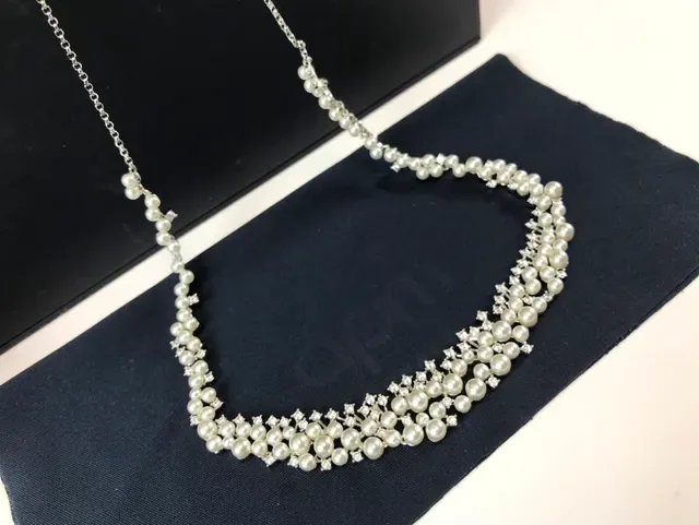 APM Monaco Multi-Strand Pearl and Star Motif Necklace 9