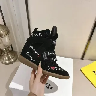 Sneakers de ante negro y beige de punta alta
