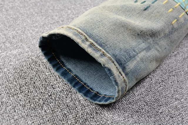 Distressed Patchwork Embroidered Light-Wash Blue Jeans 3
