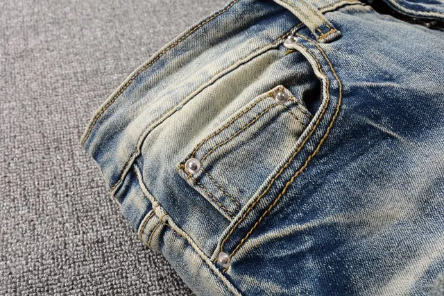 Distressed Patchwork Embroidered Light-Wash Blue Jeans 11