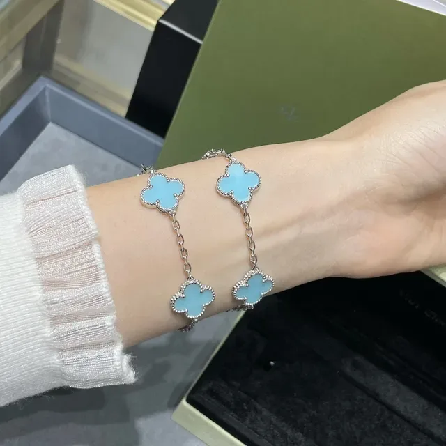 Five Clover-Shaped Light Blue Enamel Charm Bracelet 9
