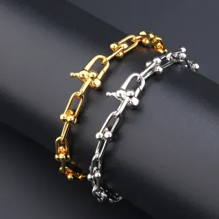 سوارات سلاسل سميكة مزينة بكرات ذهبية وفضية