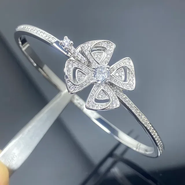 Brazaletes Bangle en tono dorado y plateado con cristales Pavé florales 3