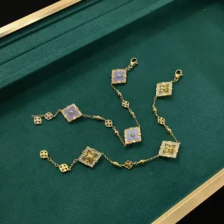 سوارات ذهبية اللون بتصميم زهور رباعي ومينا وكريستال