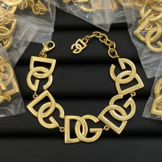 Pulseira de elos dourados com interlocking logo