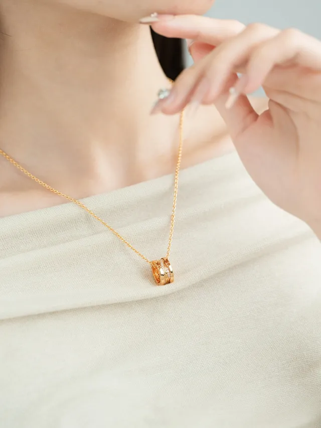 Gold-Tone Twisted Multi-Band Pavé Pendant Necklace 15