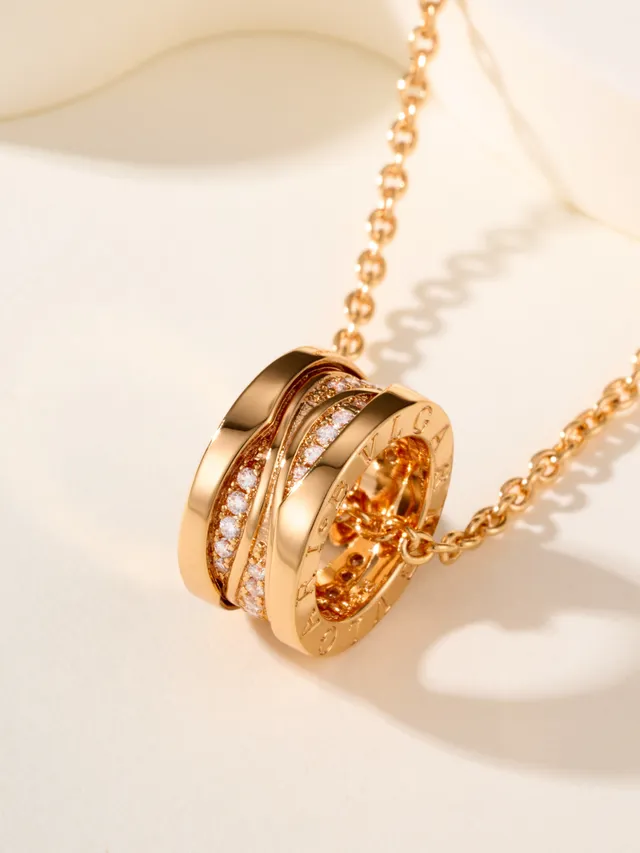 Gold-Tone Twisted Multi-Band Pavé Pendant Necklace 11