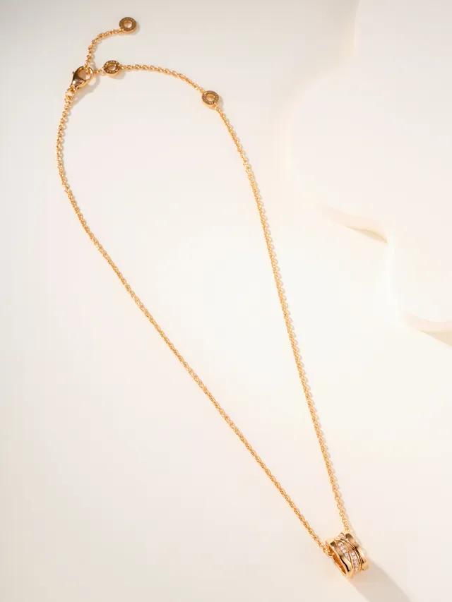 Gold-Tone Twisted Multi-Band Pavé Pendant Necklace 12