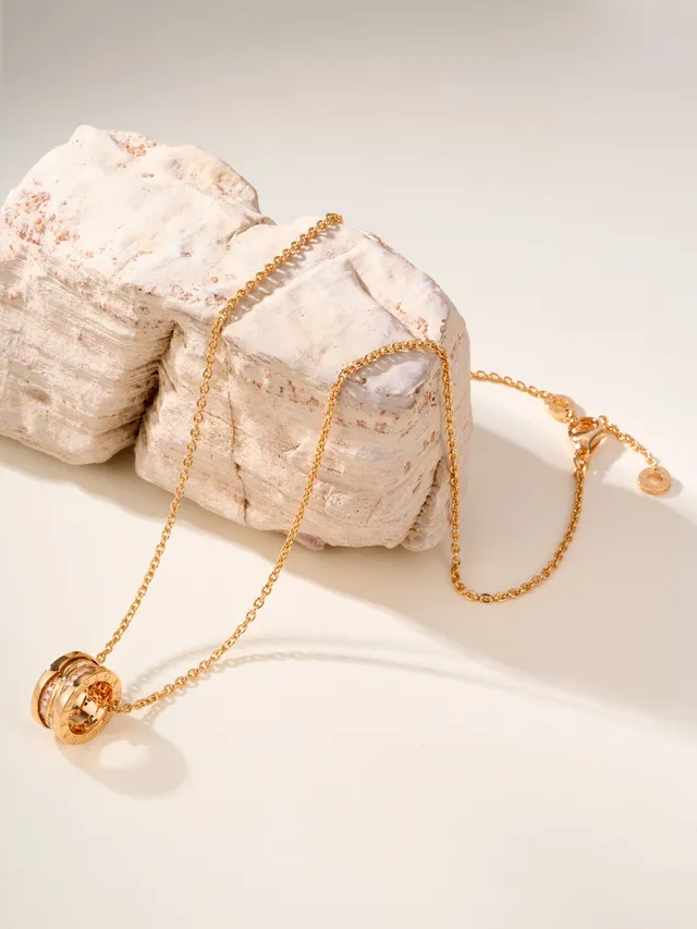 Gold-Tone Twisted Multi-Band Pavé Pendant Necklace 13
