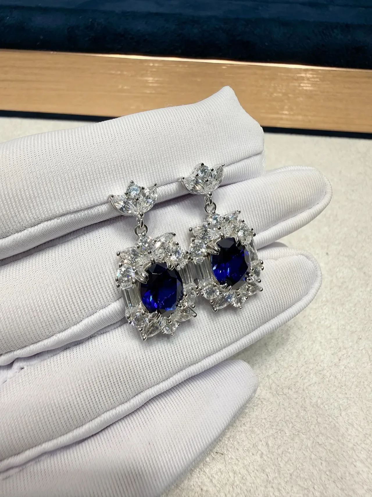Ornate Floral Motif Oval Blue Gemstone and Clear Stone Dangling Earrings 7