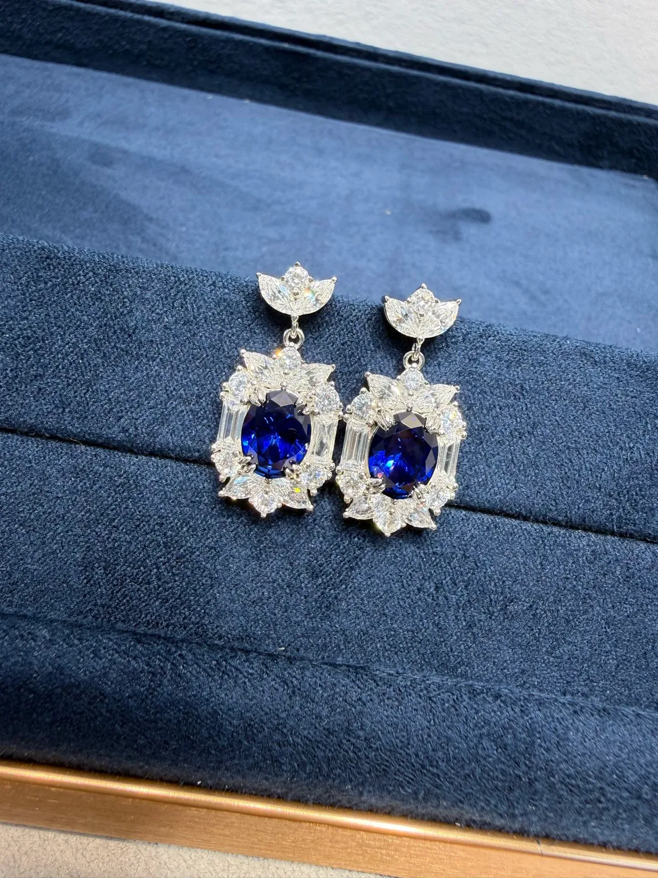 Ornate Floral Motif Oval Blue Gemstone and Clear Stone Dangling Earrings 8
