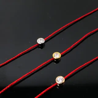 Pulsera de cordón trenzado de oro rojo con una sola piedra redonda en bisel