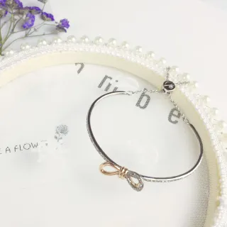 Pulsera de cristal Pavé con moño de tono plateado y doble tono
