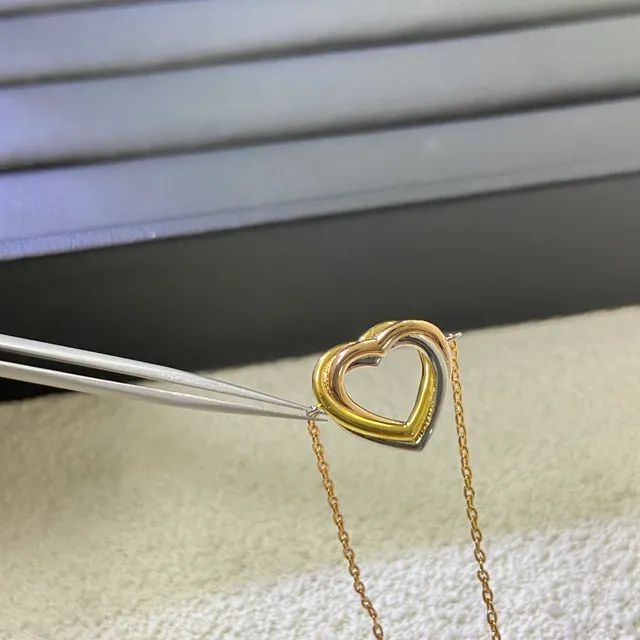 Triple-Layer Interlocking Heart Pendant Gold-Tone Chain Bracelet 4