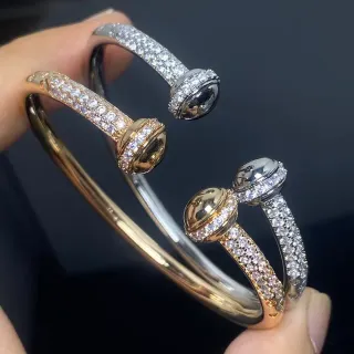 سوارات مفتوحة ثنائية اللون بنهاية كرة Pavé