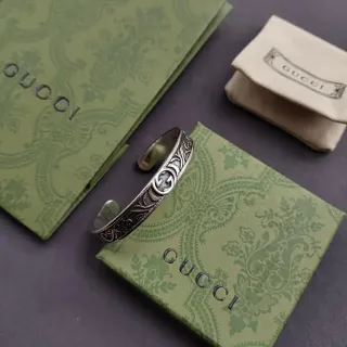 Gucci Engraved Floral Interlocking G Open Cuff Bracelet