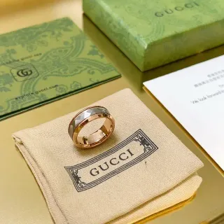 خاتم Gucci رمادي وذهب وردي واسع مقصوص