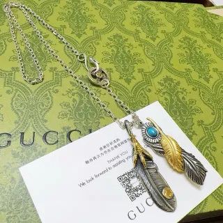 Collier Gucci Pendentif Plume Argent Or Métal Mixte