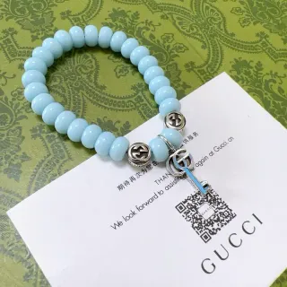 سوار Gucci Key to My Heart أزرق فضي خرز مطاطي متشابكة تعليقات G